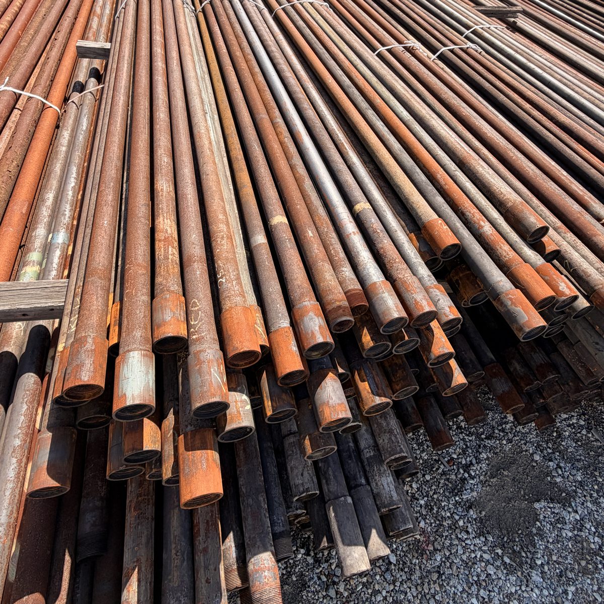 Racks of used oilfield tubing
